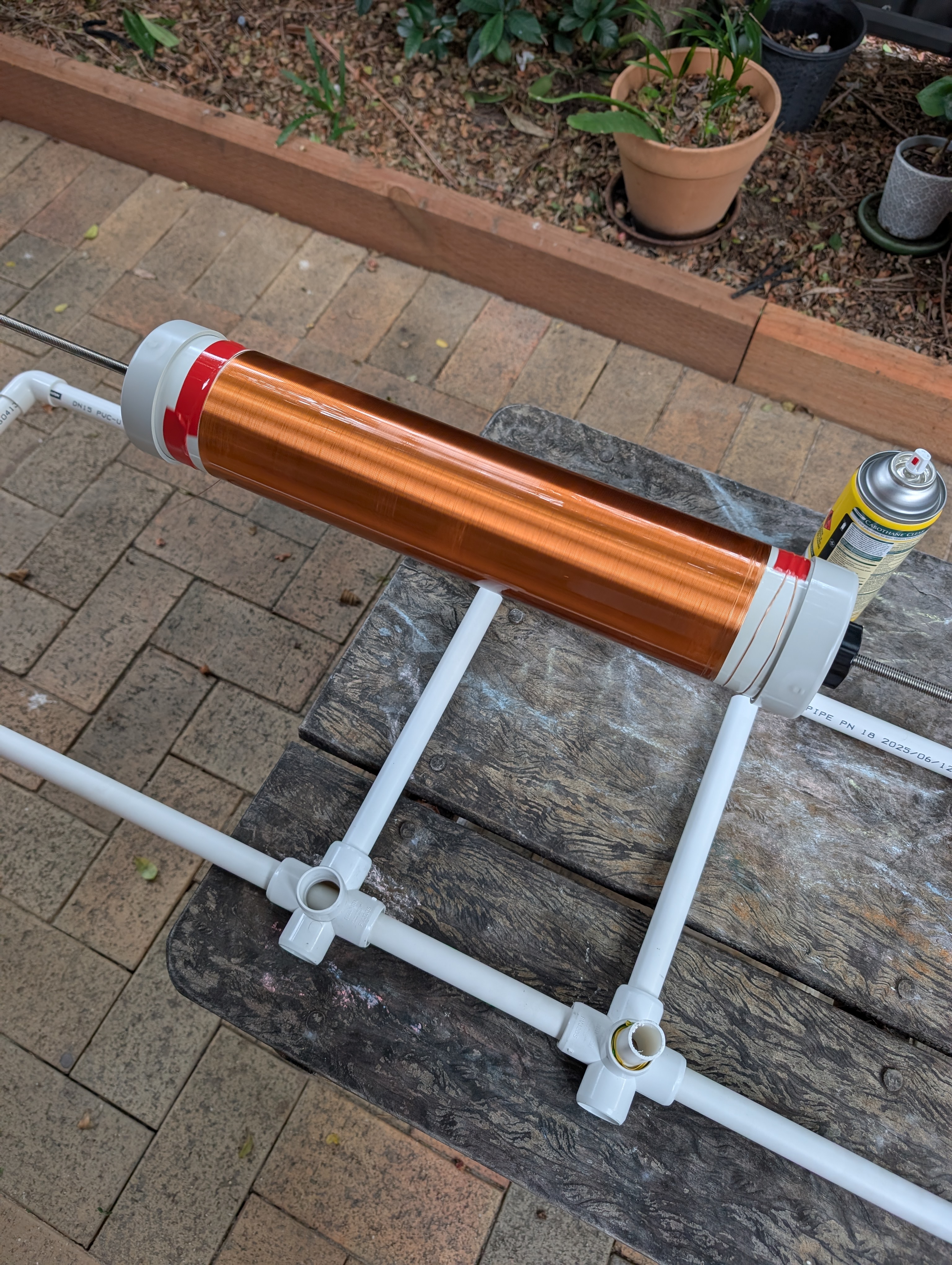 Spraying lacquer onto wound Tesla coil secondary