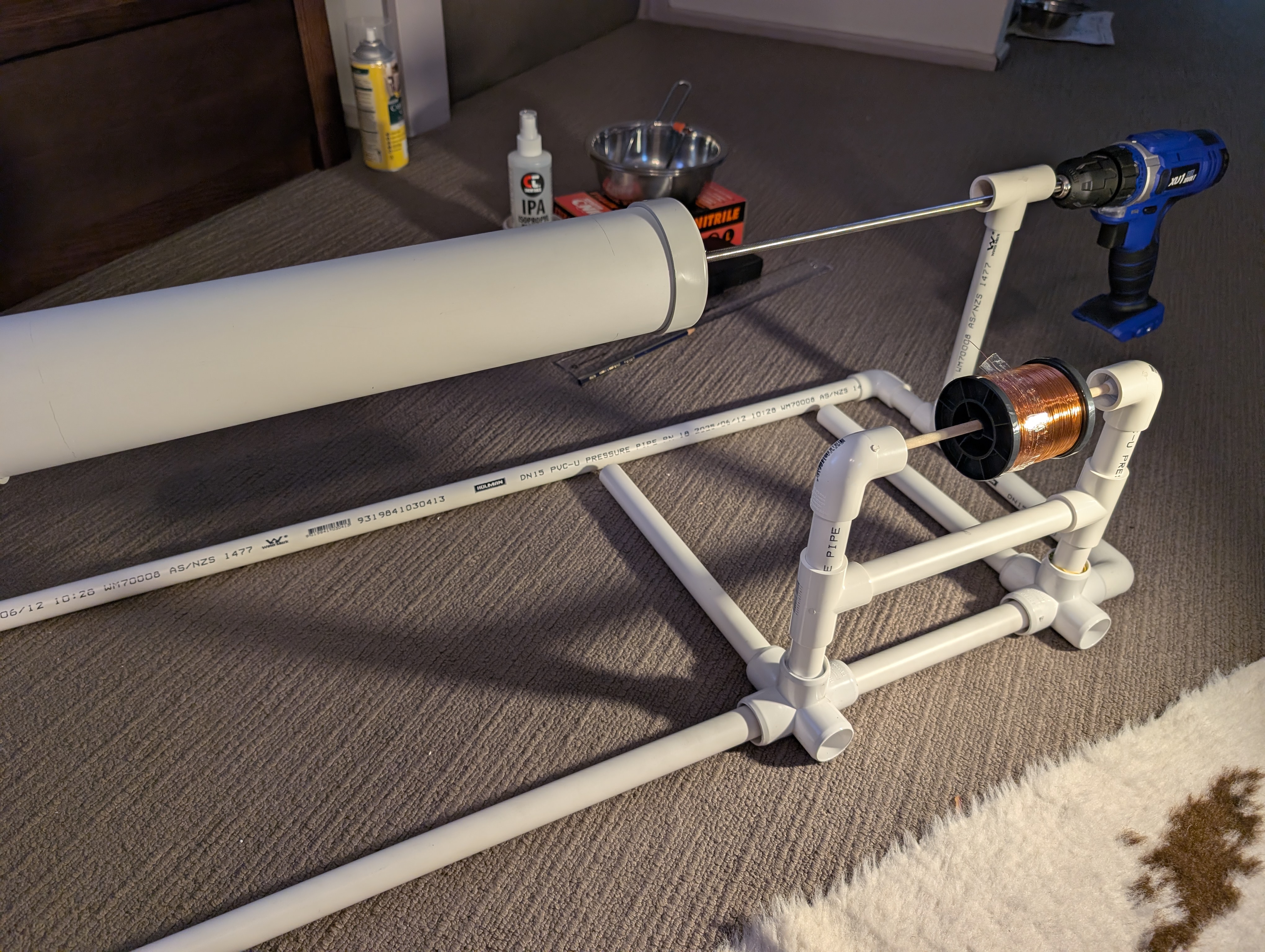 Unwound Tesla coil on winding rig ready for winding